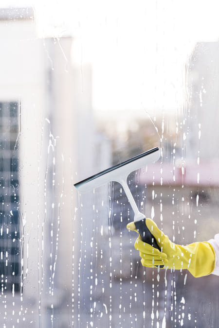 man cleaning window 1
